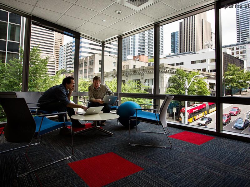 Business Teamwork in a conference room with a view
