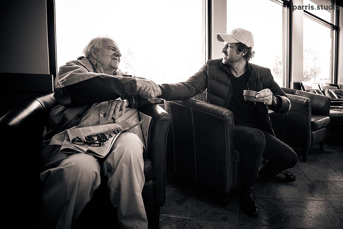 Patrick Dempsey talking to a customer at Tully's